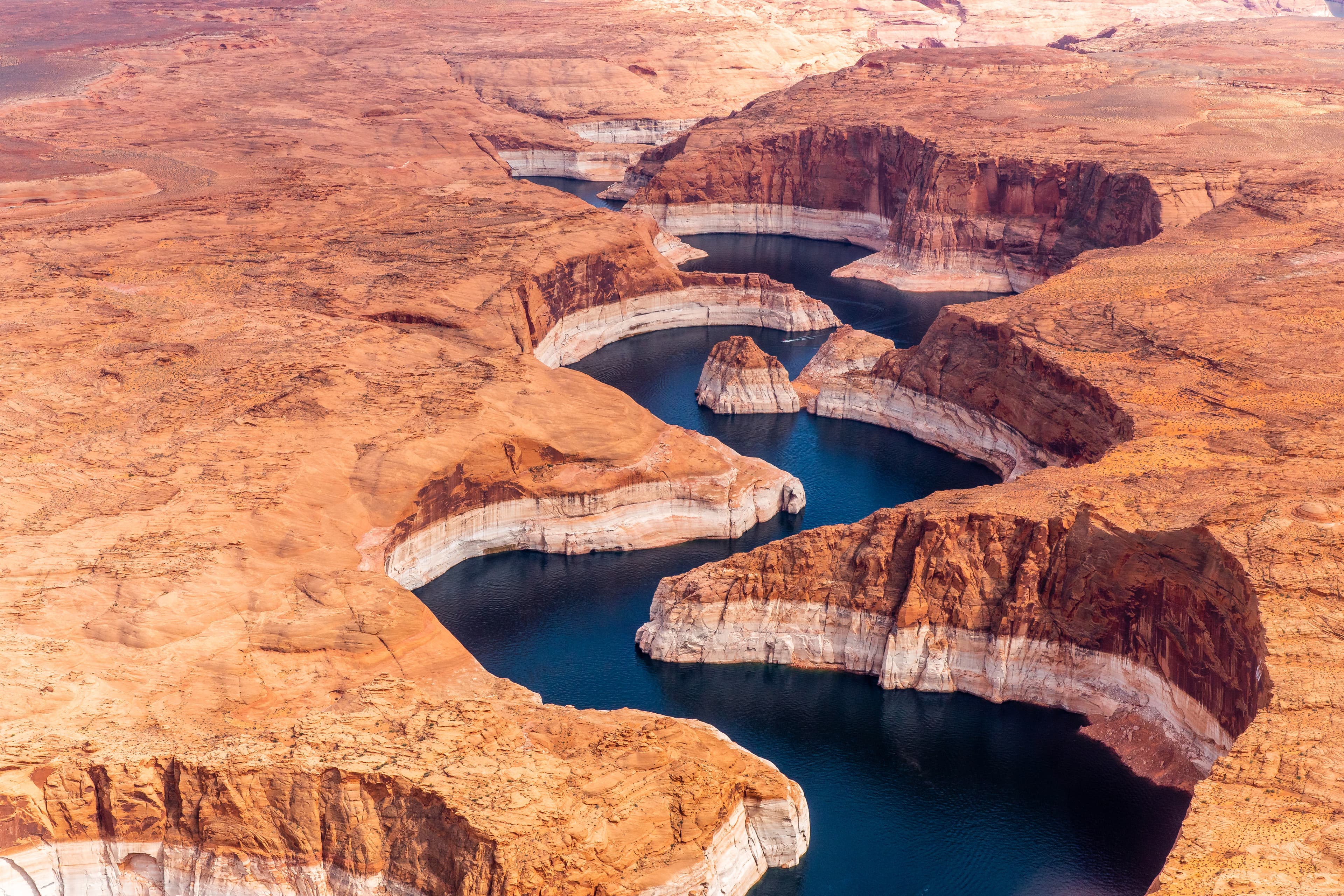 Aerial view of deeply drawn-down Lake Powell side canyons